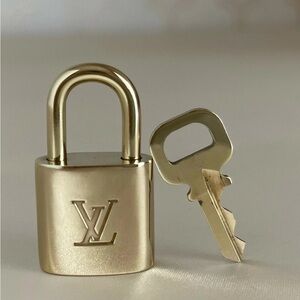 Louis Vuitton Gold Padlock and Key Set